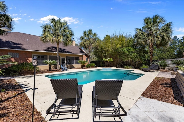 view of swimming pool with a fenced in pool, a fenced backyard, and a patio area