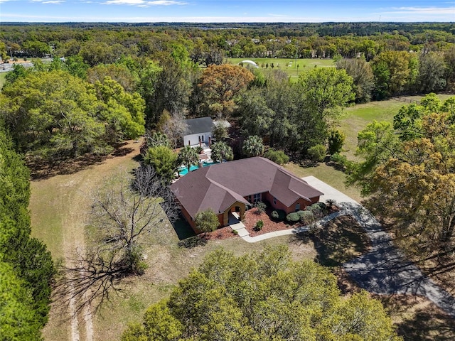 aerial view featuring a forest view
