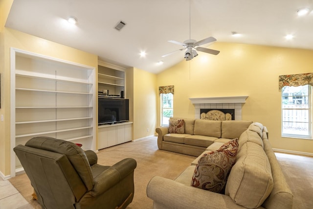 5620 NW 45th Ln, Gainesville, FL 32606 - living room featuring lofted ceiling, ceiling fan, visible vents, and light carpet