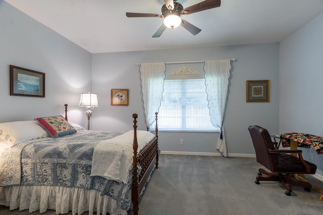5620 NW 45th Ln, Gainesville, FL 32606 - bedroom featuring baseboards, carpet flooring, and ceiling fan