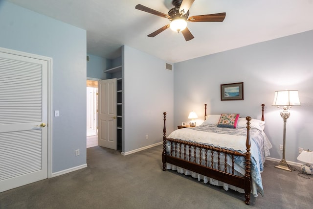 5620 NW 45th Ln, Gainesville, FL 32606 - carpeted bedroom with baseboards, ceiling fan, and visible vents