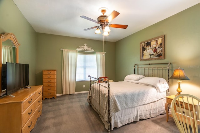 5620 NW 45th Ln, Gainesville, FL 32606 - bedroom with baseboards, ceiling fan, and dark carpet