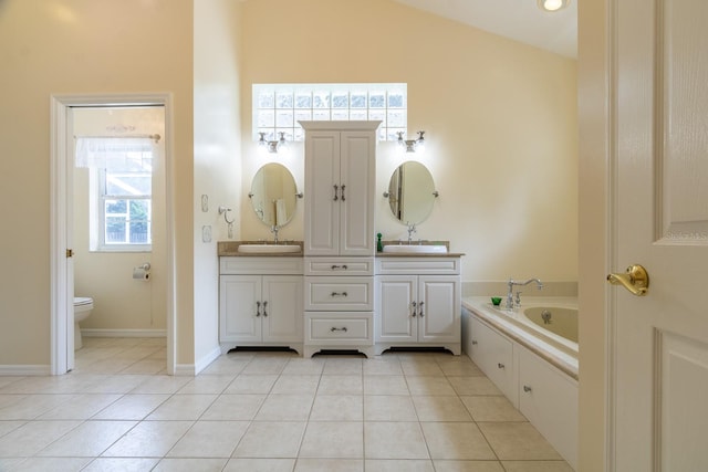 5620 NW 45th Ln, Gainesville, FL 32606 - bathroom with tile patterned flooring, a sink, and toilet