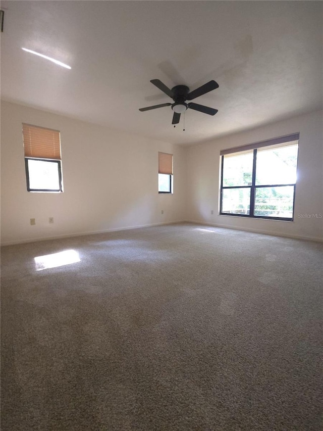 7717 SW 22nd Ave, Gainesville, FL 32607 - carpeted spare room featuring ceiling fan