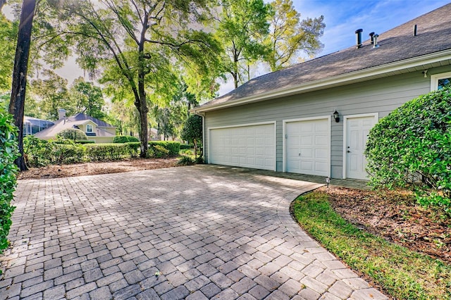 4630 SW 95th Ter, Gainesville, FL 32608 - garage with decorative driveway