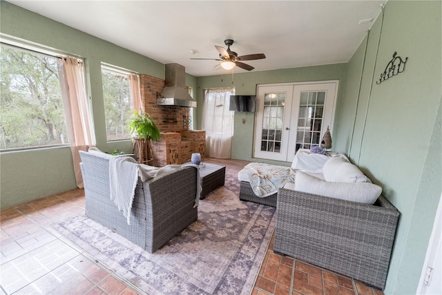 6550 SE 123rd Ter, Morriston, FL 32668 - living room with ceiling fan and french doors