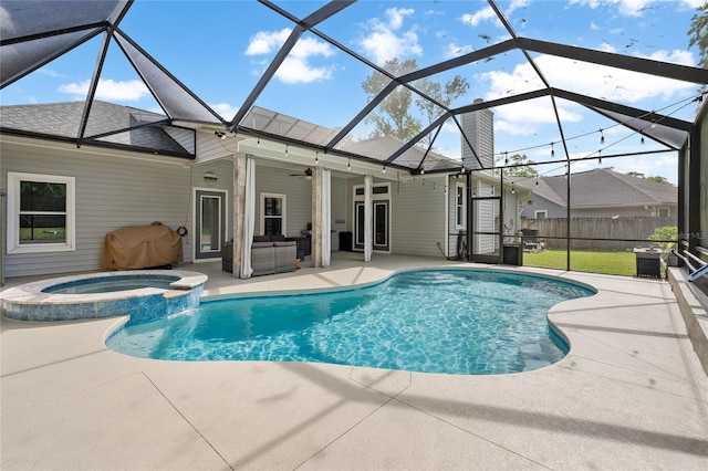 view of swimming pool with a patio, outdoor lounge area, ceiling fan, a pool with connected hot tub, and fence