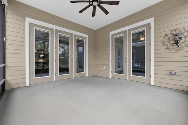 unfurnished sunroom with french doors