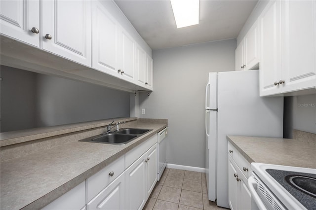 501 SW 75th St Unit E3, Gainesville, FL 32607 - kitchen featuring white dishwasher, white cabinets, light countertops, and a sink