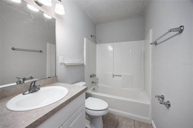 501 SW 75th St Unit E3, Gainesville, FL 32607 - bathroom featuring vanity, toilet, tile patterned flooring, and bathtub / shower combination