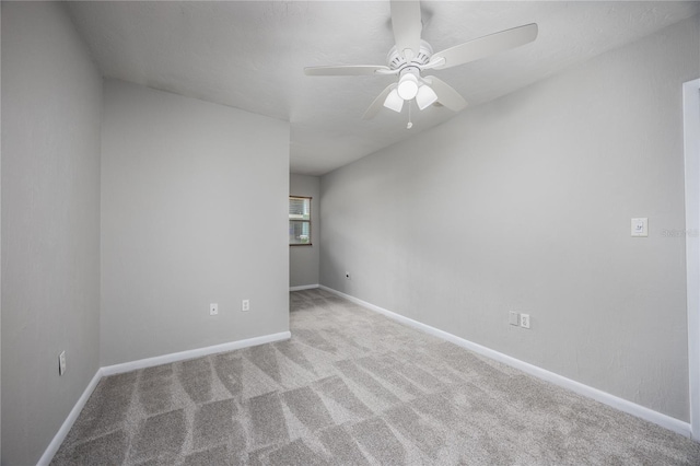 501 SW 75th St Unit E3, Gainesville, FL 32607 - spare room with carpet, ceiling fan, and baseboards