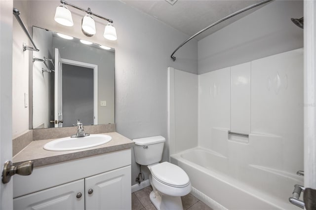 501 SW 75th St Unit E3, Gainesville, FL 32607 - bathroom with toilet, vanity, tub / shower combination, and tile patterned floors