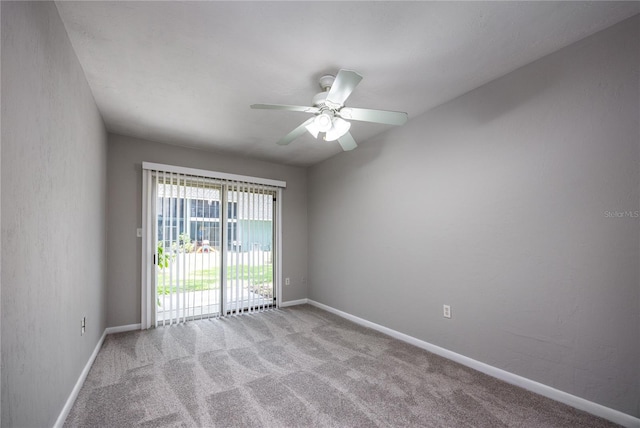 501 SW 75th St Unit E3, Gainesville, FL 32607 - empty room featuring carpet, ceiling fan, and baseboards