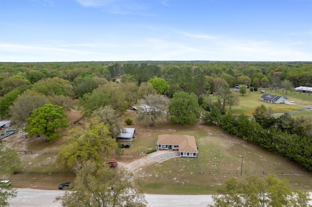 aerial view with a wooded view