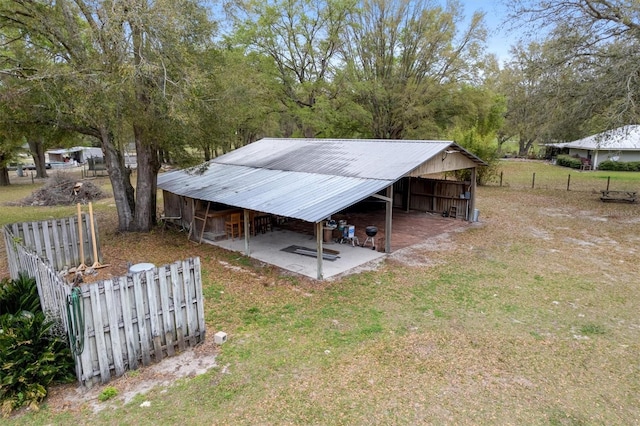 exterior space with a yard and fence