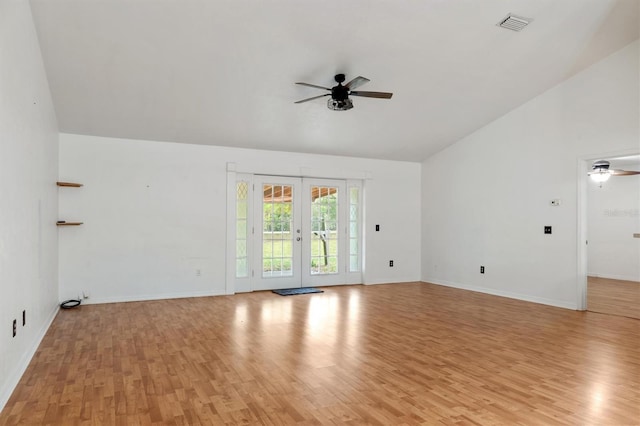 unfurnished room with light wood finished floors, visible vents, ceiling fan, and french doors