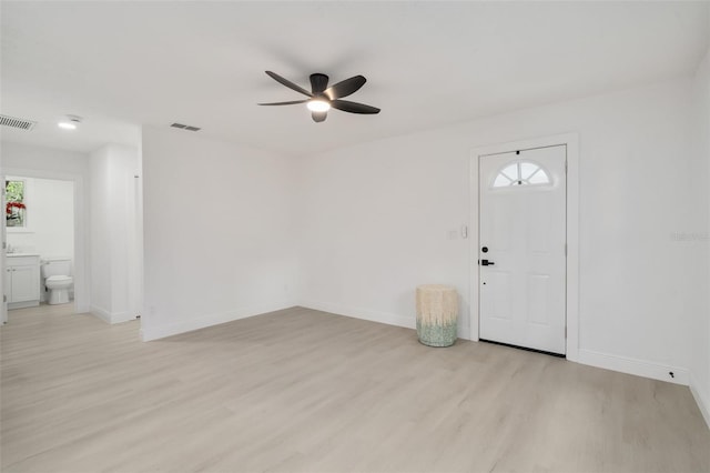 4120 NW 10th St, Gainesville, FL 32609 - foyer with a ceiling fan, light wood-style floors, plenty of natural light, and baseboards