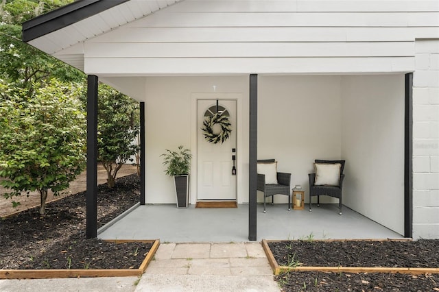 4120 NW 10th St, Gainesville, FL 32609 - view of exterior entry featuring concrete block siding