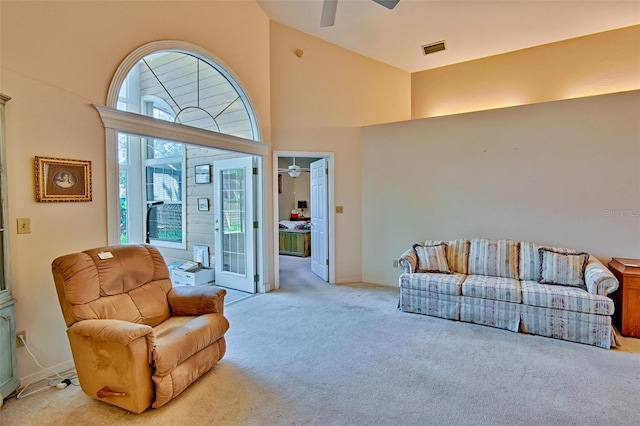 12332 NW 7th Ln, Newberry, FL 32669 - carpeted living area featuring ceiling fan, baseboards, a towering ceiling, and visible vents