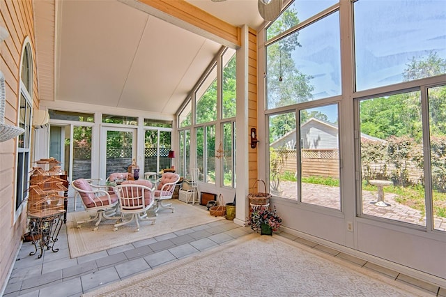 12332 NW 7th Ln, Newberry, FL 32669 - sunroom / solarium featuring lofted ceiling, a healthy amount of sunlight, and tile patterned floors