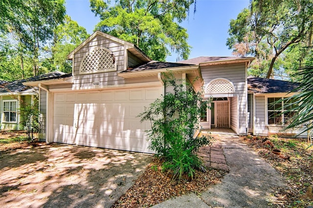 12332 NW 7th Ln, Newberry, FL 32669 - view of front of house featuring an attached garage and concrete driveway