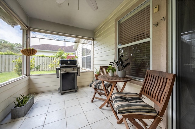 balcony featuring ceiling fan and a grill