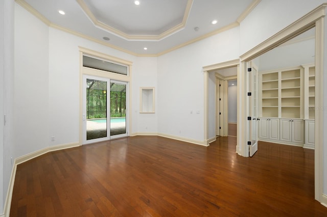 4535 SW 105th Dr, Gainesville, FL 32608 - spare room featuring hardwood / wood-style flooring, crown molding, a tray ceiling, recessed lighting, and baseboards