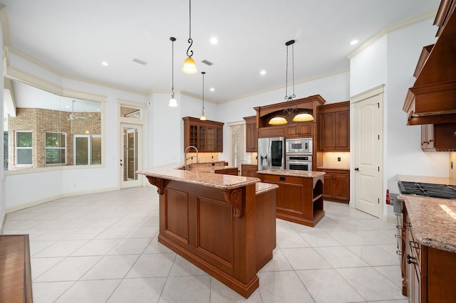 4535 SW 105th Dr, Gainesville, FL 32608 - kitchen featuring appliances with stainless steel finishes, a spacious island, crown molding, light tile patterned floors, and custom range hood
