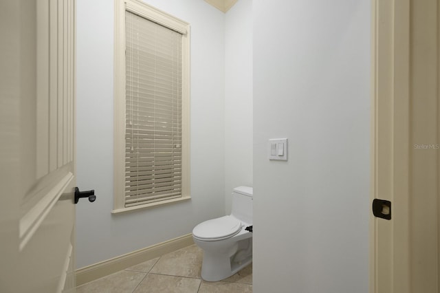 4535 SW 105th Dr, Gainesville, FL 32608 - bathroom with tile patterned floors, toilet, and baseboards