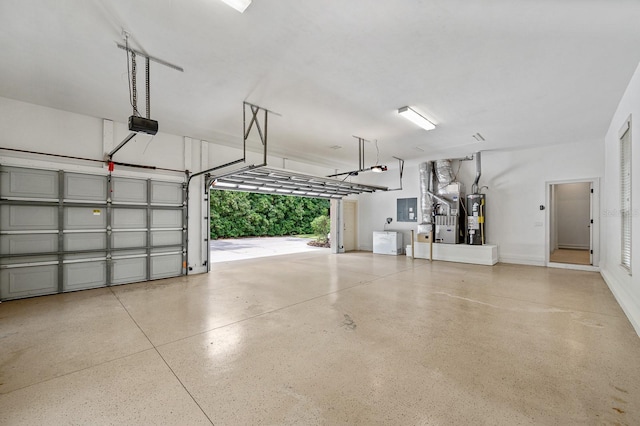 4535 SW 105th Dr, Gainesville, FL 32608 - garage with water heater, a garage door opener, electric panel, and heating unit