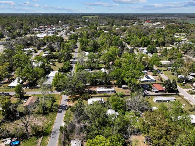 bird's eye view featuring a view of trees