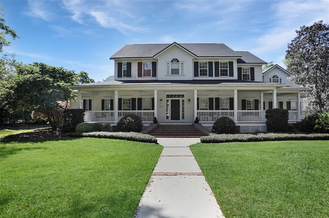 view of front of house featuring a front yard and a porch
