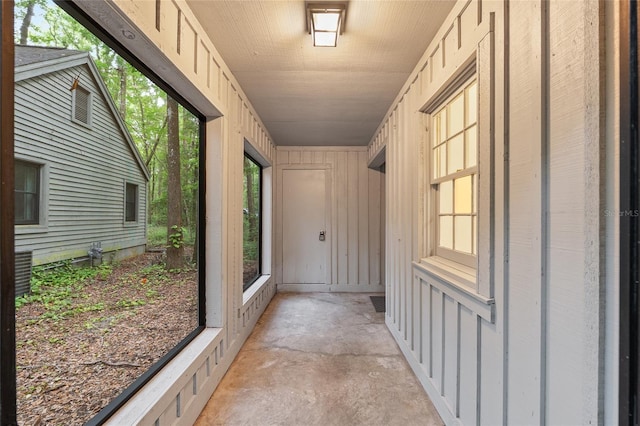 hall with concrete floors