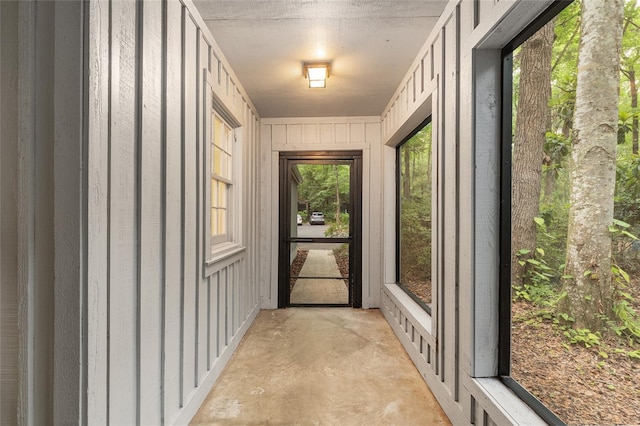 doorway featuring concrete flooring