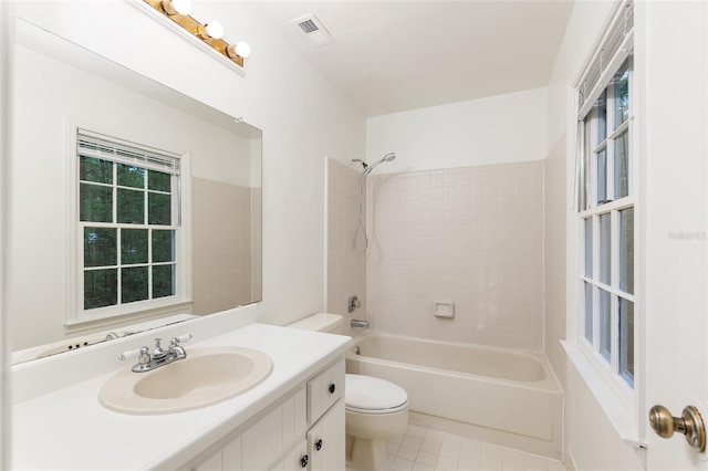 full bath featuring toilet, tub / shower combination, vanity, and tile patterned flooring