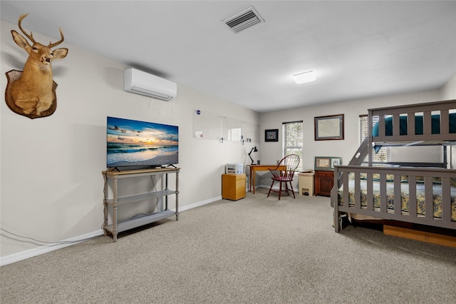 carpeted bedroom with baseboards, visible vents, and an AC wall unit