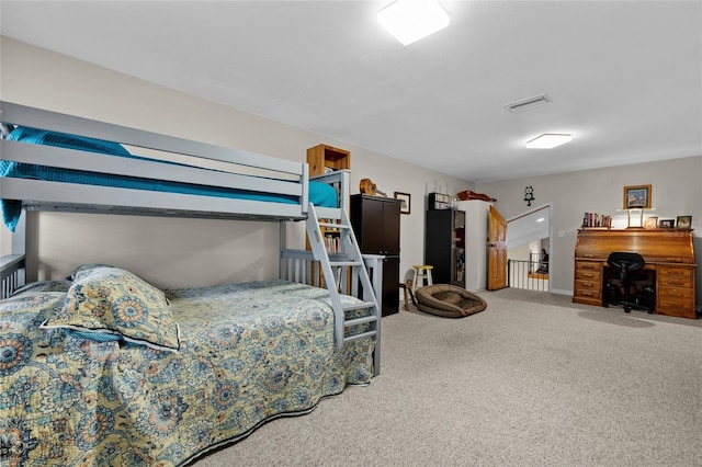 bedroom featuring visible vents and carpet
