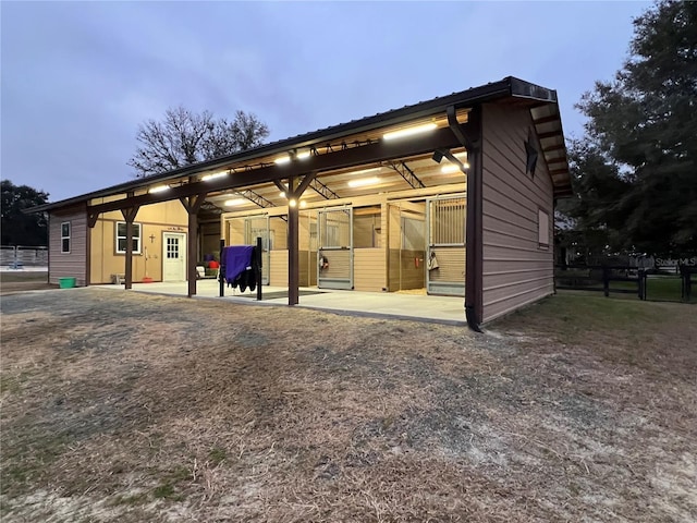 back of property with fence
