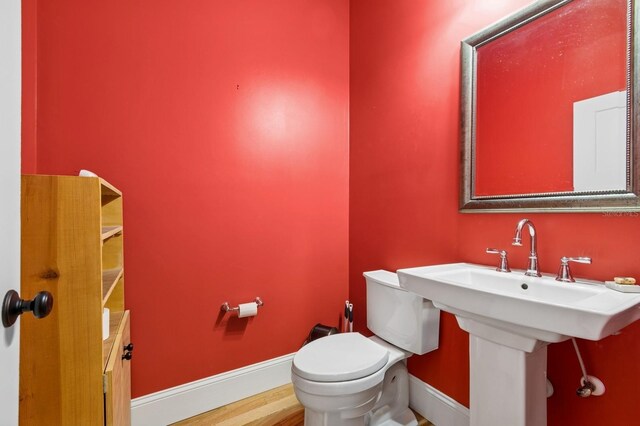 620 NE 6th Ave, Gainesville, FL 32601 - half bath featuring toilet and baseboards