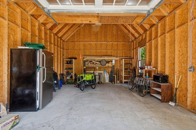 620 NE 6th Ave, Gainesville, FL 32601 - garage with freestanding refrigerator