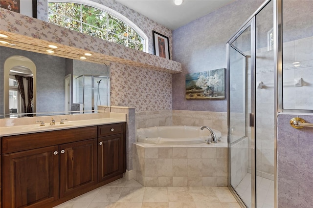 full bath with a garden tub, vanity, tile patterned flooring, and a stall shower