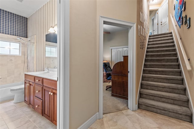 stairs with tile patterned floors