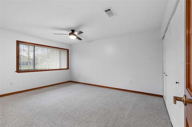 2822 SW 14th Dr Unit 307, Gainesville, FL 32608 - empty room featuring carpet floors and a ceiling fan