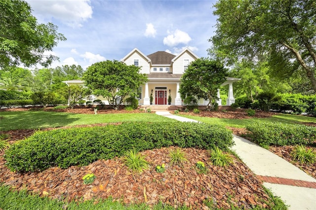 view of front of home featuring a front lawn
