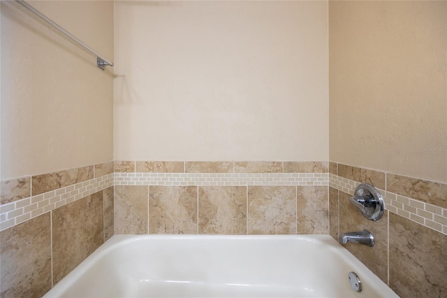 bathroom featuring a bath