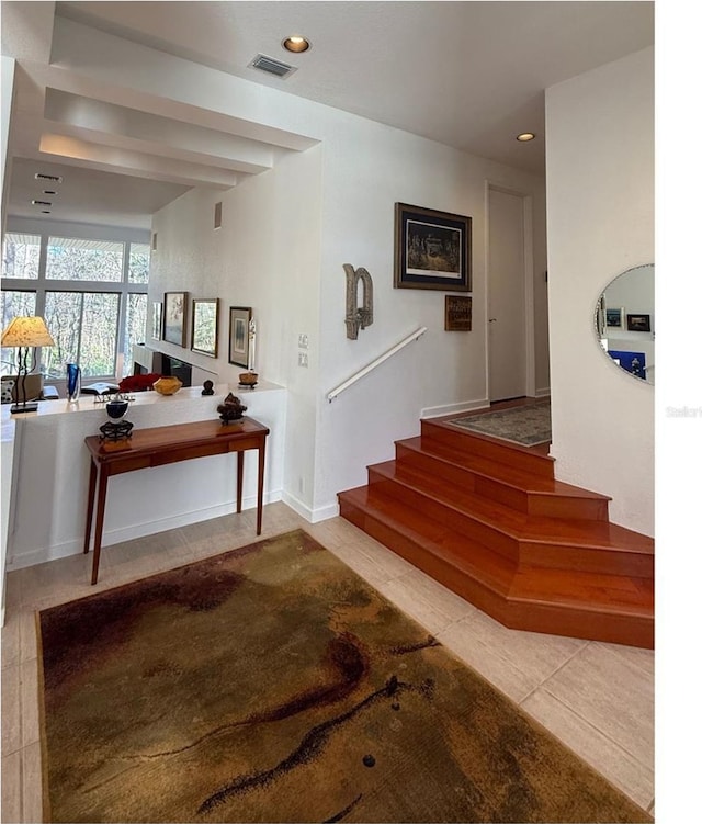 3200 NW 21st Ave, Gainesville, FL 32605 - staircase with tile patterned floors and recessed lighting