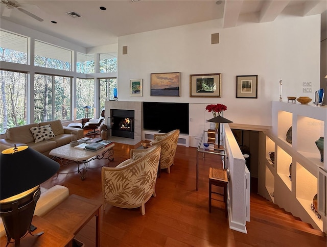 3200 NW 21st Ave, Gainesville, FL 32605 - living room with wood finished floors and a tiled fireplace