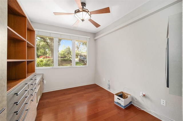 3200 NW 21st Ave, Gainesville, FL 32605 - unfurnished office featuring ceiling fan, wood finished floors, and baseboards