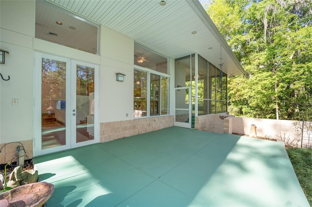 3200 NW 21st Ave, Gainesville, FL 32605 - view of patio with a sunroom and french doors