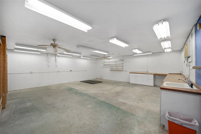 3200 NW 21st Ave, Gainesville, FL 32605 - garage with a sink and a ceiling fan